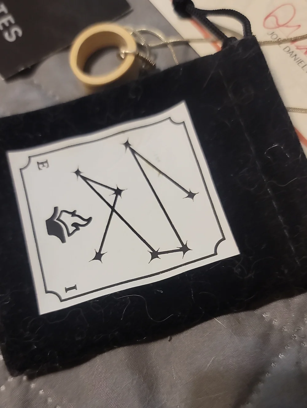 Lit Escalates Addie LaRue Wooden Ring Necklace